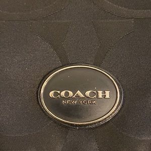 Black Coach shoulder bag.
